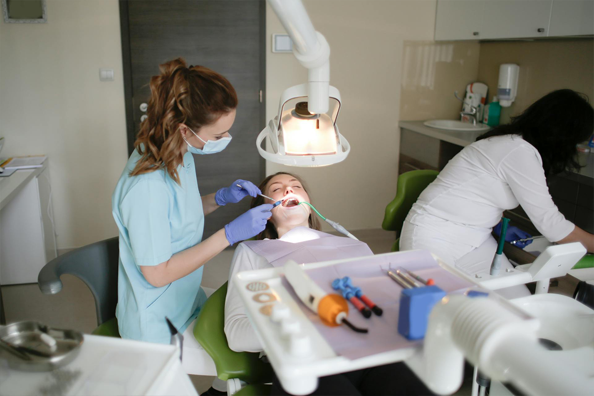 Dentists Working on Lady
